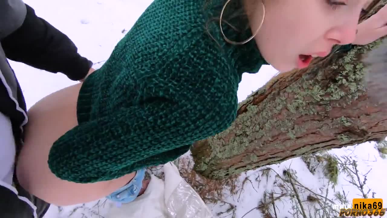 Russian young woman fucks with a guy in the forest in the cold at temperatures of -40